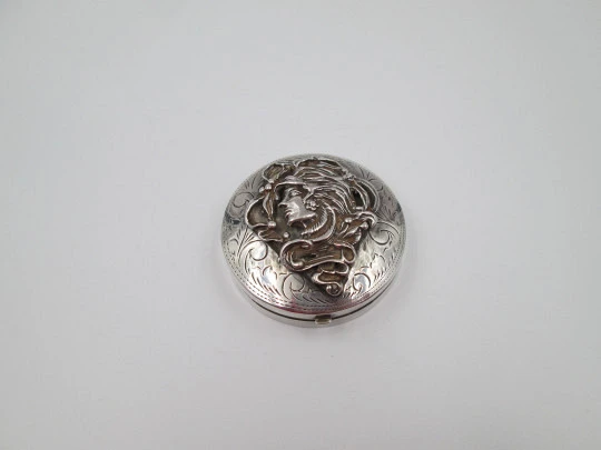 Table pillbox. 925 sterling silver. Women's bust high relief. Articulated lid. 1970's. Europe