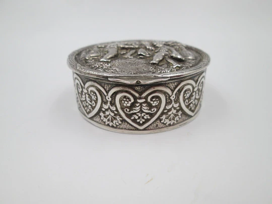 Table pillbox. Sterling silver and vermeil. High relief celebration scene. 1960's. Europe