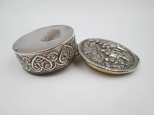 Table pillbox. Sterling silver and vermeil. High relief celebration scene. 1960's. Europe