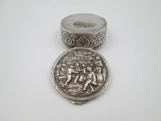 Table pillbox. Sterling silver and vermeil. High relief celebration scene. 1960's. Europe