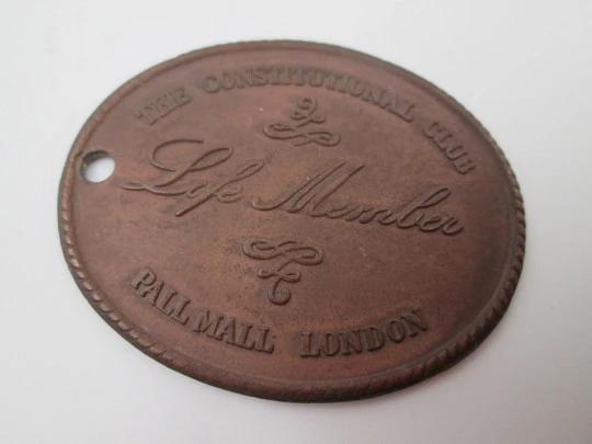 The Constitutional Club life member copper medal (London). Hole on top. England. 1920's