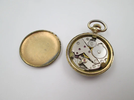 Thermidor women's pendant watch. Gold plated metal. Manual wind. Floral motifs. 1960's