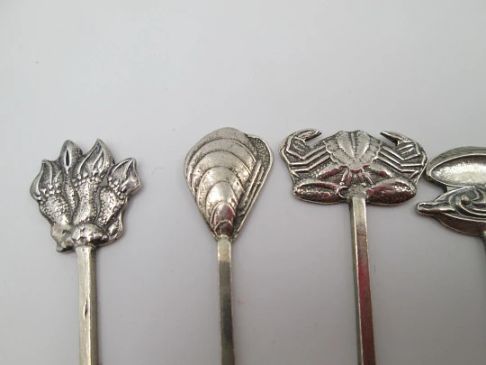 Thirteen cocktail picks collection. 925 sterling silver. Seafood motifs. Spain. 1980's