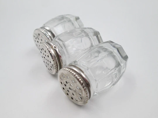 Three salt shakers set. Sterling silver screw caps and carved crystal bodies. 1960's