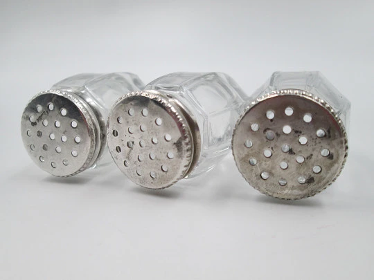 Three salt shakers set. Sterling silver screw caps and carved crystal bodies. 1960's