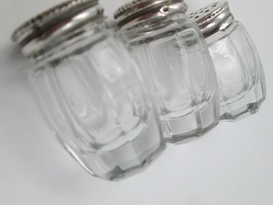 Three salt shakers set. Sterling silver screw caps and carved crystal bodies. 1960's