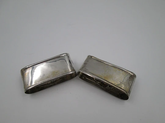 Two napkin rings. 833 sterling silver. Fruits and flowers. 1950's. Portugal (Porto)