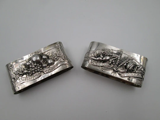 Two napkin rings. 833 sterling silver. Fruits and flowers. 1950's. Portugal (Porto)