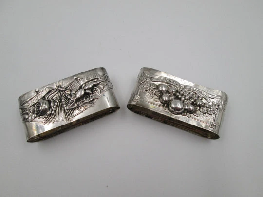 Two napkin rings. 833 sterling silver. Fruits and flowers. 1950's. Portugal (Porto)