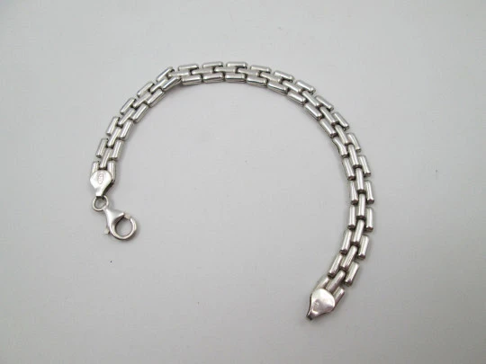 Unisex articulated bracelet. 925 sterling silver. Fretwork design. Carabiner clasp. 1990's