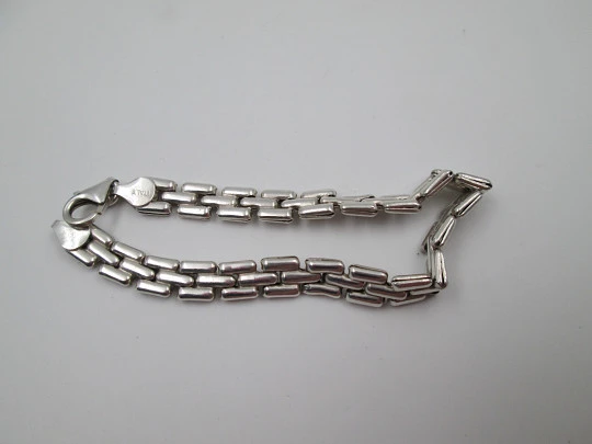 Unisex articulated bracelet. 925 sterling silver. Fretwork design. Carabiner clasp. 1990's