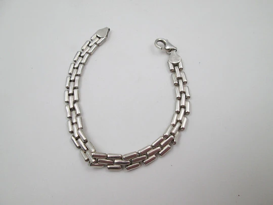 Unisex articulated bracelet. 925 sterling silver. Fretwork design. Carabiner clasp. 1990's