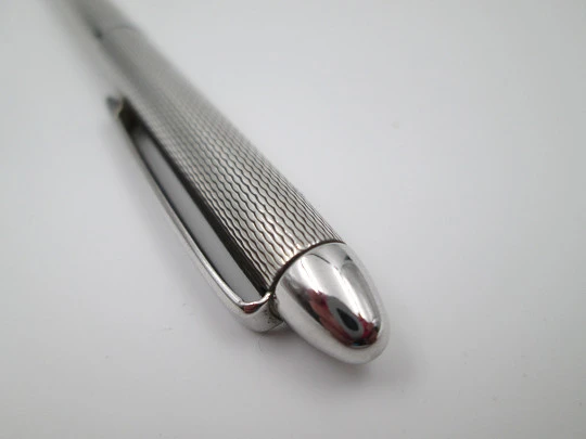 Usus ballpoint pen. 925 sterling silver. Guilloche motif. Twist mechanism. 1970's