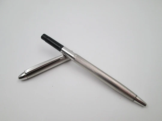 Usus ballpoint pen. 925 sterling silver. Guilloche motif. Twist mechanism. 1970's