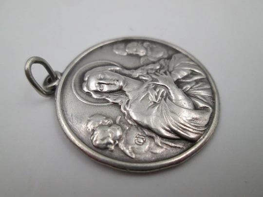 Virgin Mary with cherub busts medal. Sterling silver. Handle and ring. Spain. 1970's