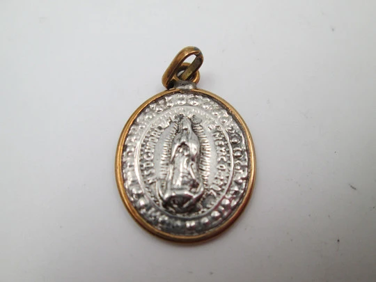 Virgin of Guadalupe medal. 925 sterling silver. 10 karat gold ring and edge. Mexico, 1804