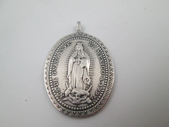 Virgin of Guadalupe religious medal. 925 sterling silver. Ring on top. Mexico, 1900's