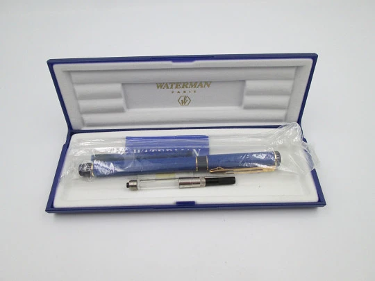 Waterman Centurion. Blue lacquer and purple plastic. Gold plated details. Box. 1990's