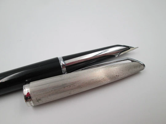 Waterman C/F fountain pen. Black plastic & rolled silver. 18k gold nib. Cartridge. 1970's