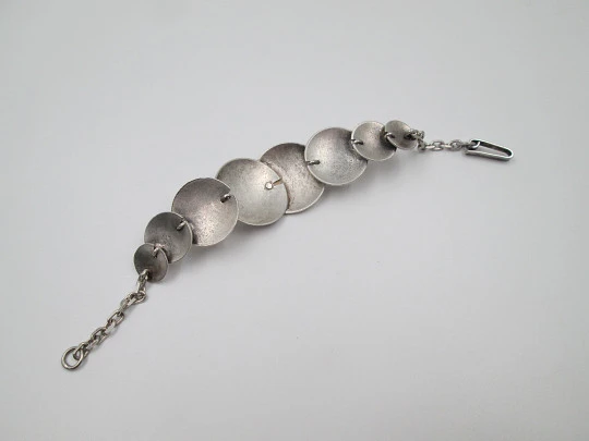 Women's bracelet. Sterling silver. Circles ornate pattern. Hook clasp. Europe. 1980's