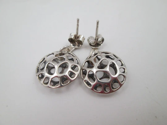 Women's earrings. Sterling silver. Openwork circles and bars. Friction back closure. 1990's