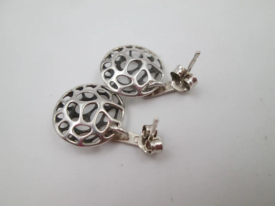 Women's earrings. Sterling silver. Openwork circles and bars. Friction back closure. 1990's