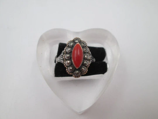 Women's shuttle ring. Sterling silver and gold edge. Marcasite and red coral. 1980. Europe