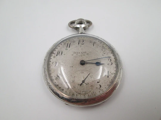 Zeda open-faced pocket watch. Stem-wind. 800 sterling silver. Floral motifs. Swiss. 1920's